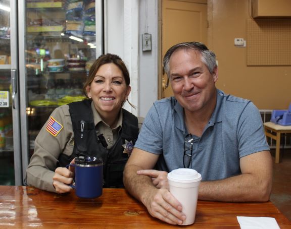 Image 12 of 18 in gallery section. Image title is Beckie coffee with a cop.