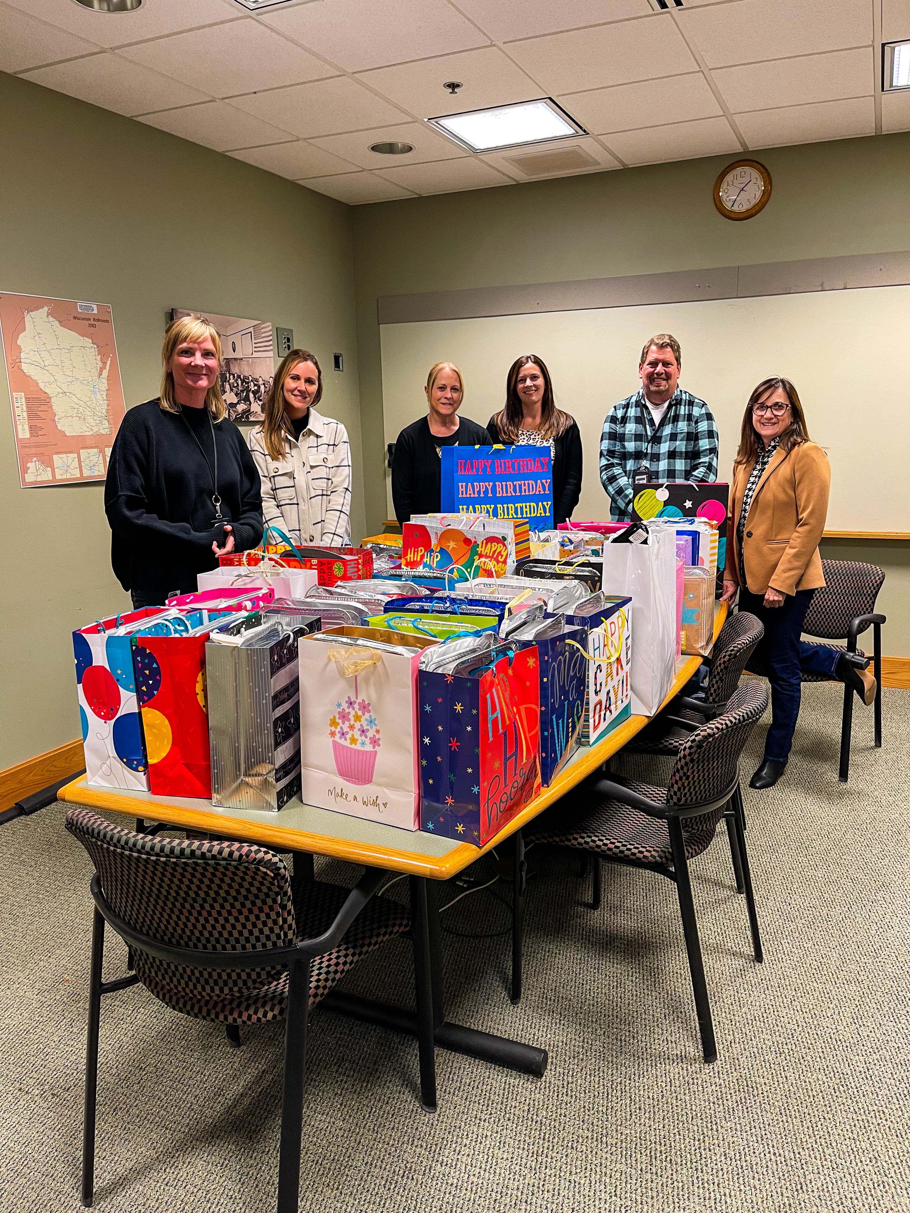 Image 16 of 16 in gallery section. Image title is City Staff Came Together to Donate Birthday Kits to Badger Prairie Food Pantry.