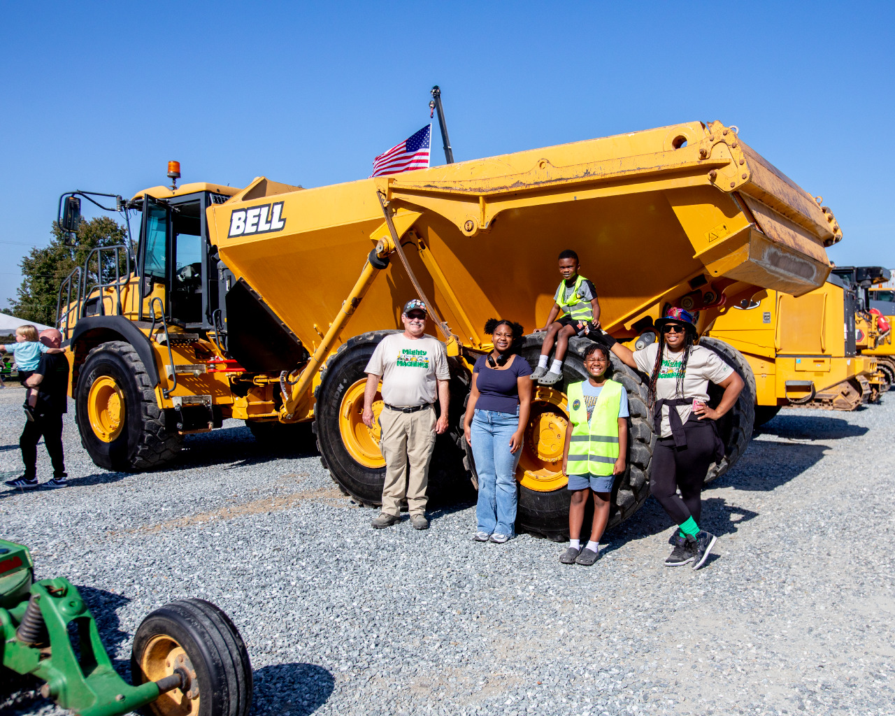 Image 3 of 10 in gallery section. Image title is City Staff with guests Mighty Machines Ivan Cutler photo (1).