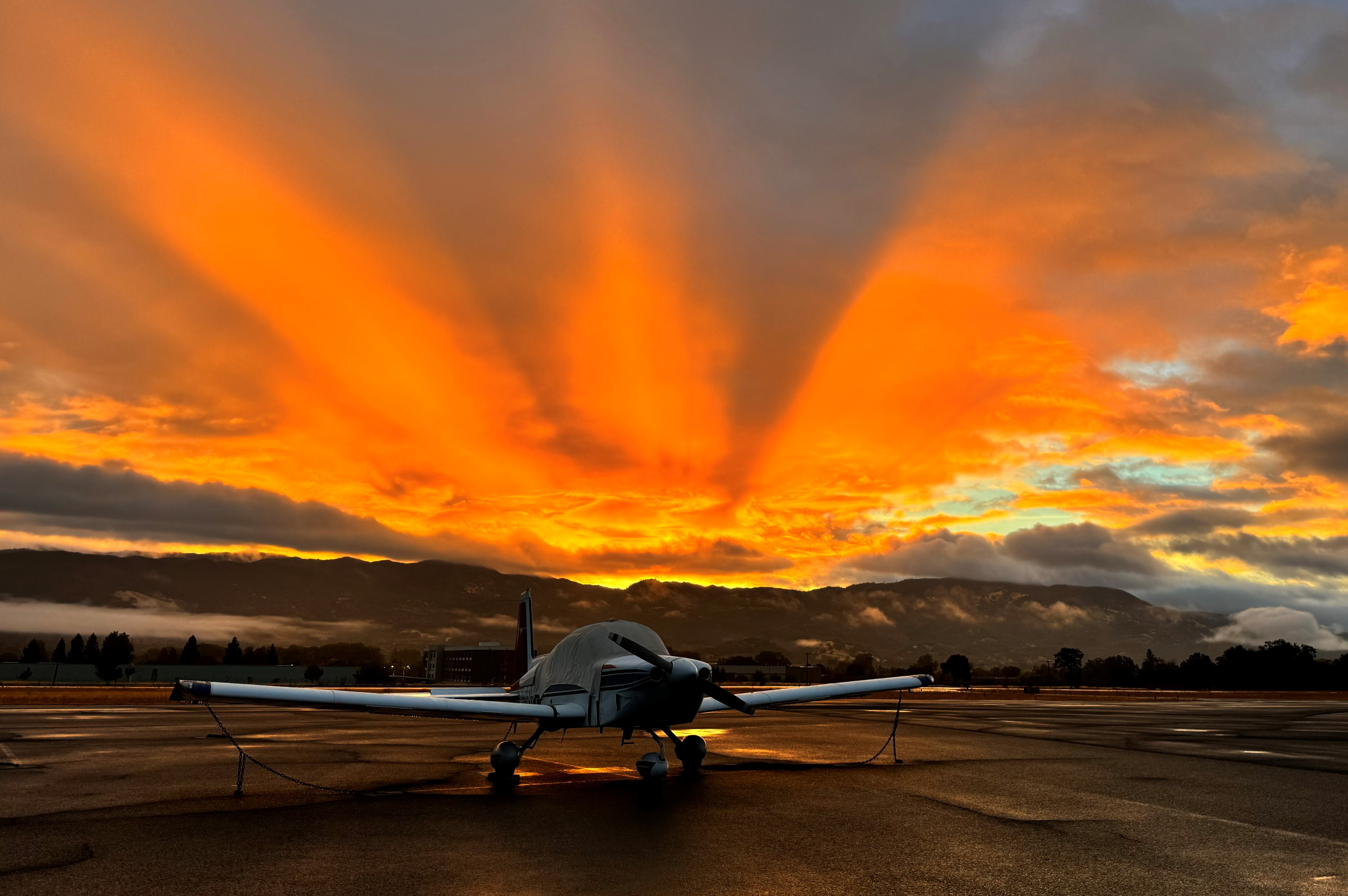 Item 3 of 6 in gallery section. Title is Airport Sunrise.