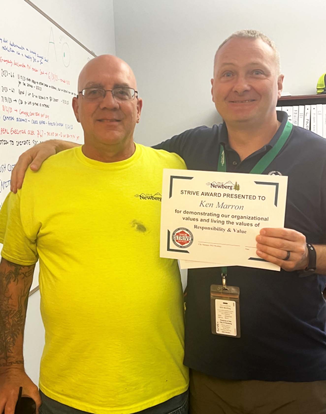 Image 2 of 5 in gallery section. Image title is Ken is presented with the award for Responsibility AND Value.