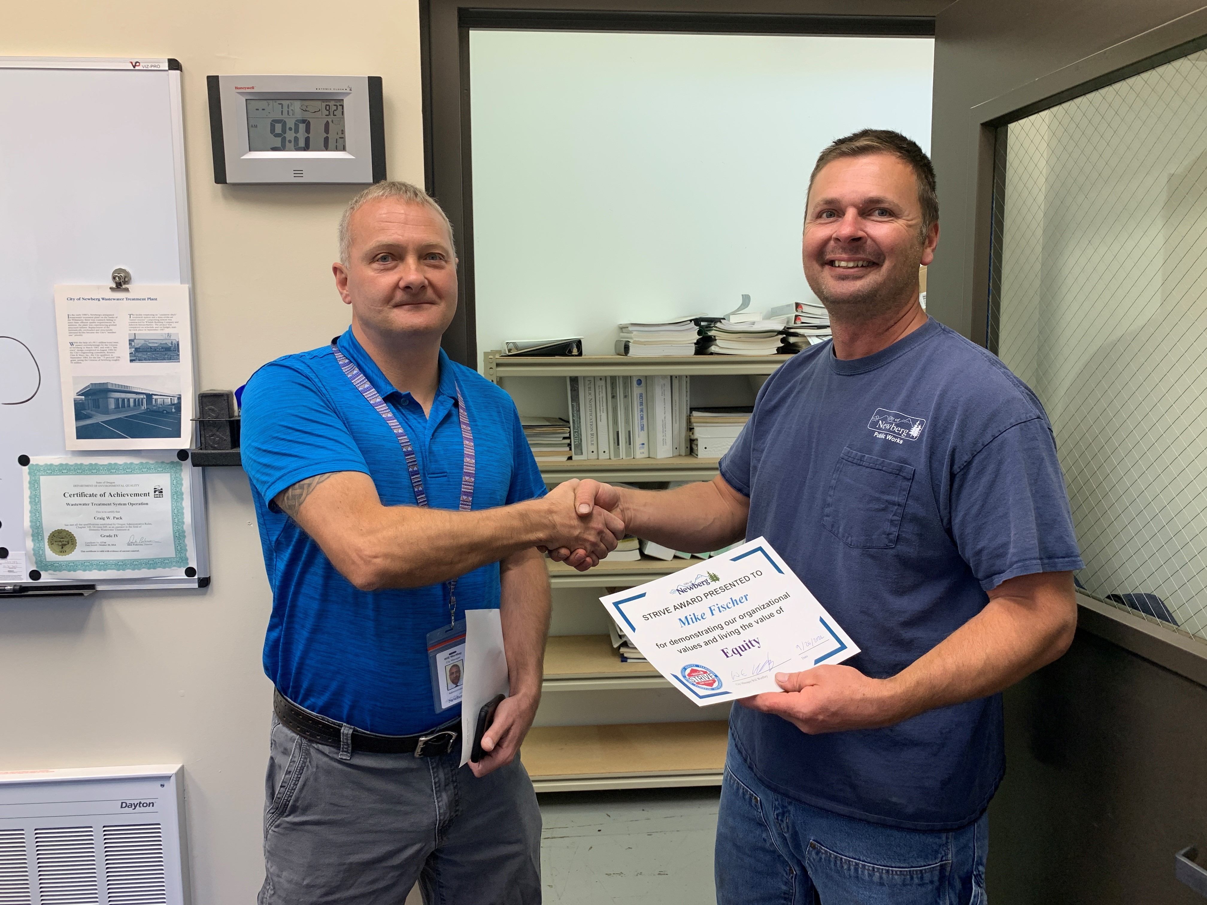 Image 4 of 5 in gallery section. Image title is Mike is presented with the Equity award..