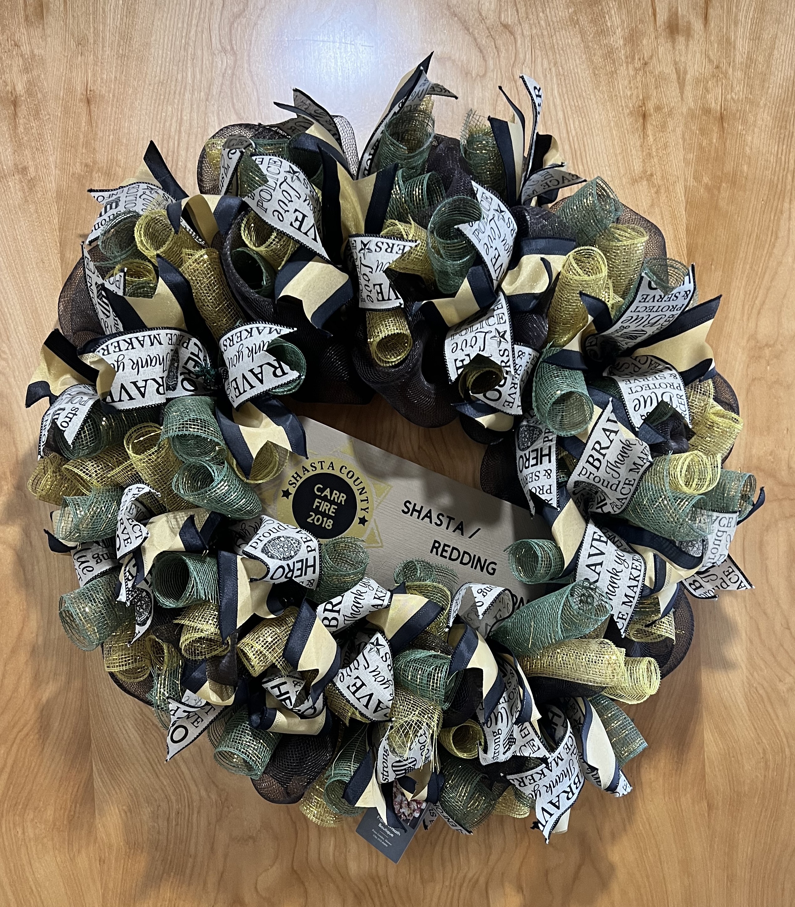 Image 23 of 26 in gallery section. Image title is Sheriff's Office wreath.