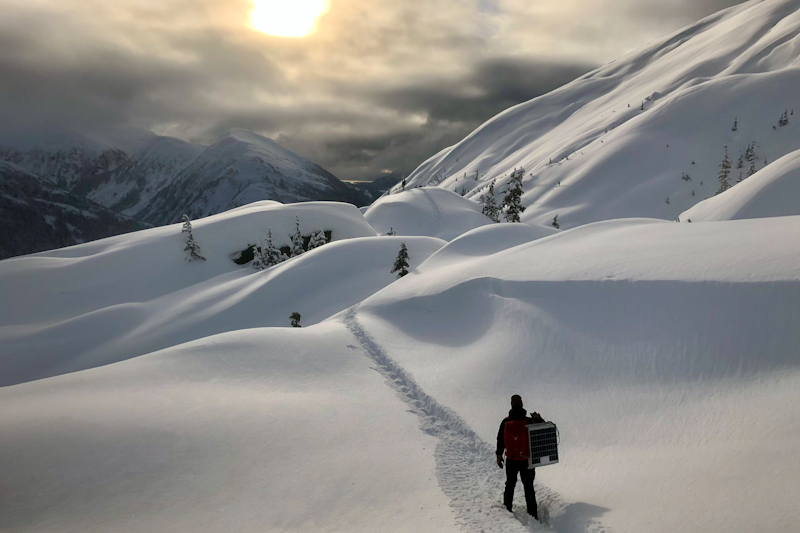 Image 10 of 28 in gallery section. Image title is SnettishamCarryingGearToWxStation_edited.