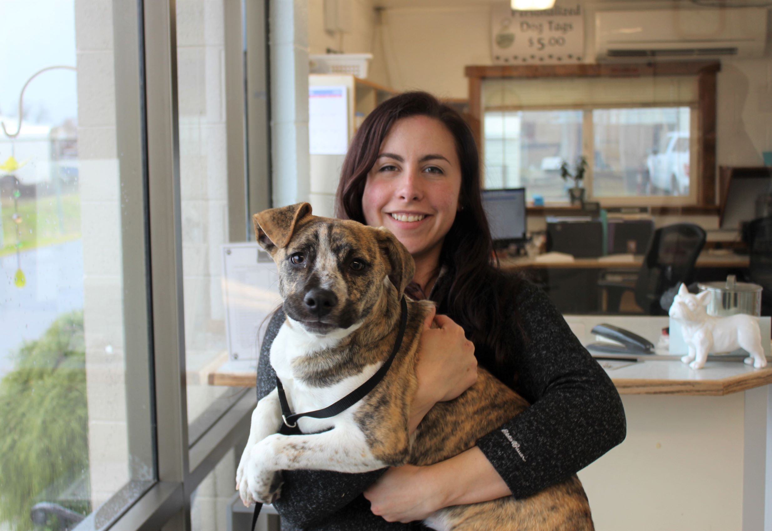 Image 13 of 18 in gallery section. Image title is Madeline with dog.
