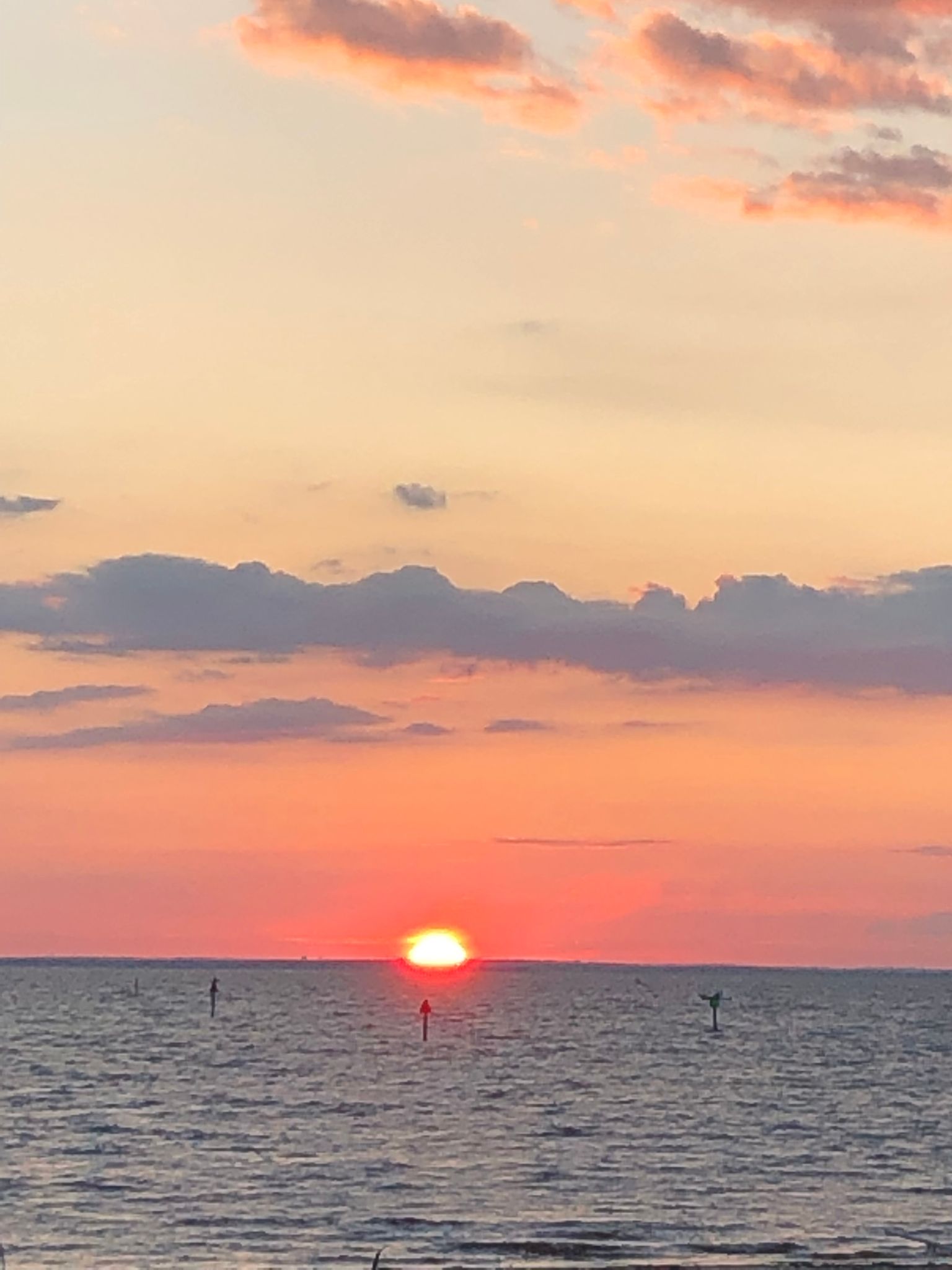 Image 1 of 11 in gallery section. Image title is Sunset on the bay.