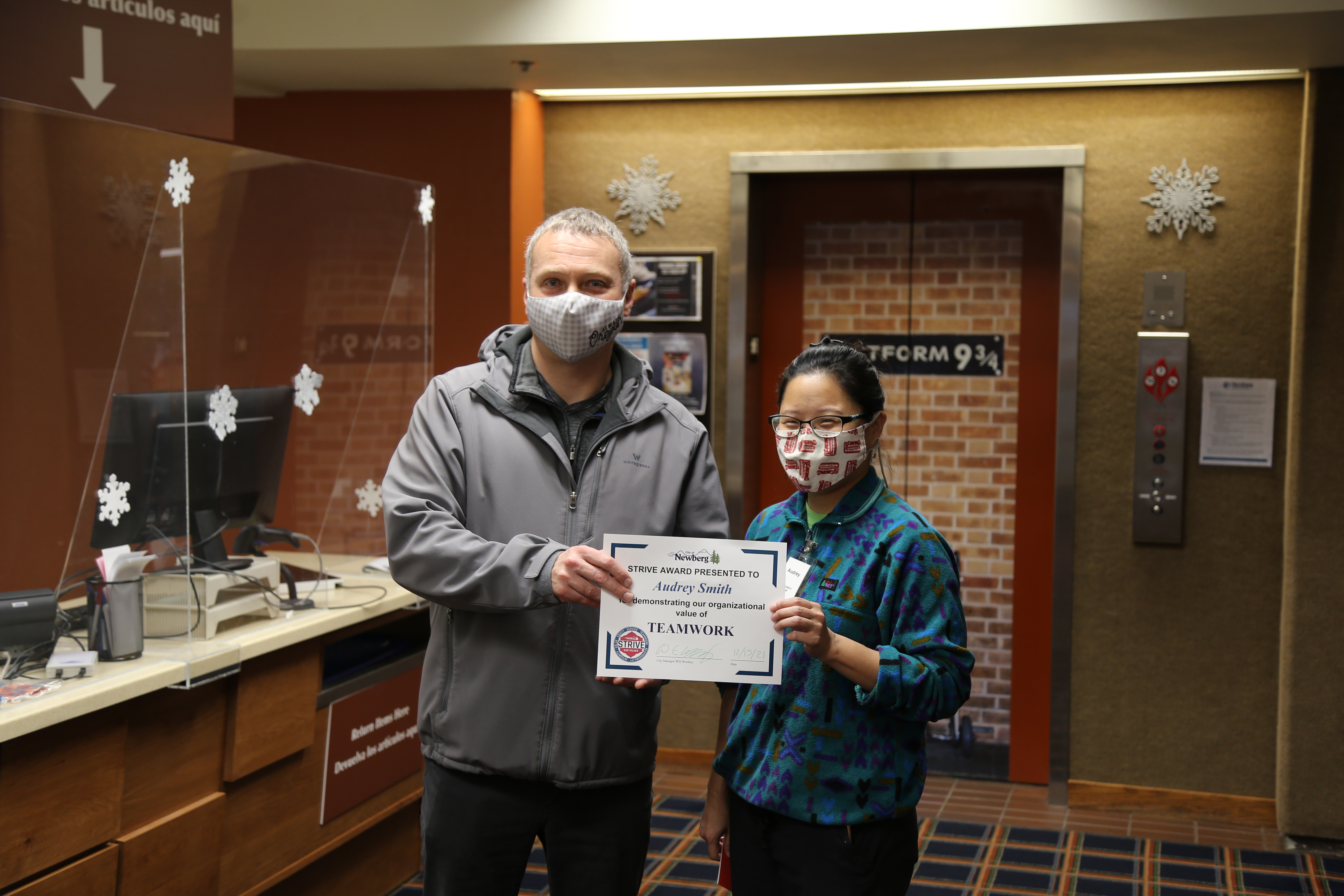 Image 5 of 5 in gallery section. Image title is Audrey is presented with the award for Teamwork..
