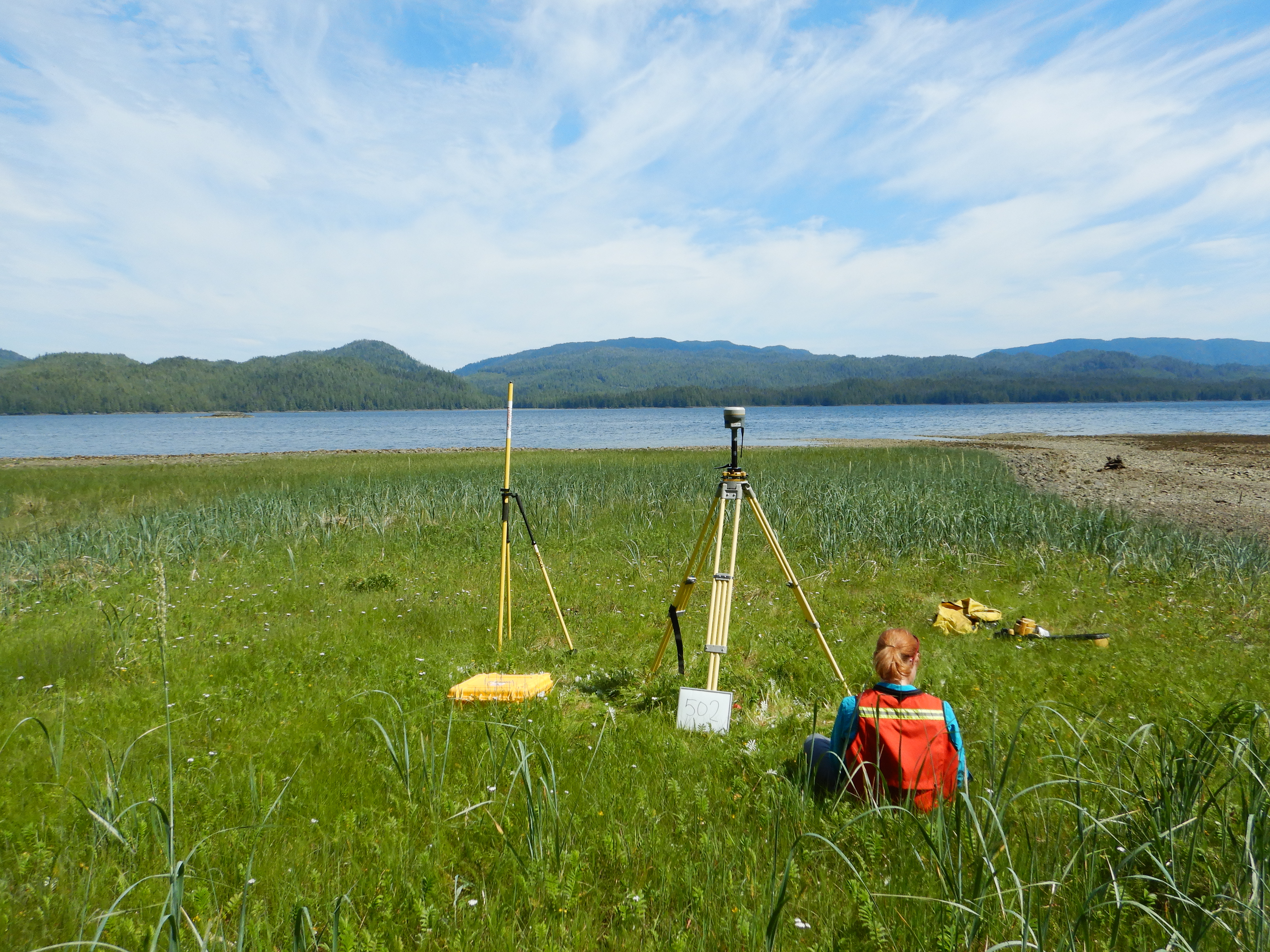 Image 9 of 10 in gallery section. Image title is Surveyor Sitting with GPS.