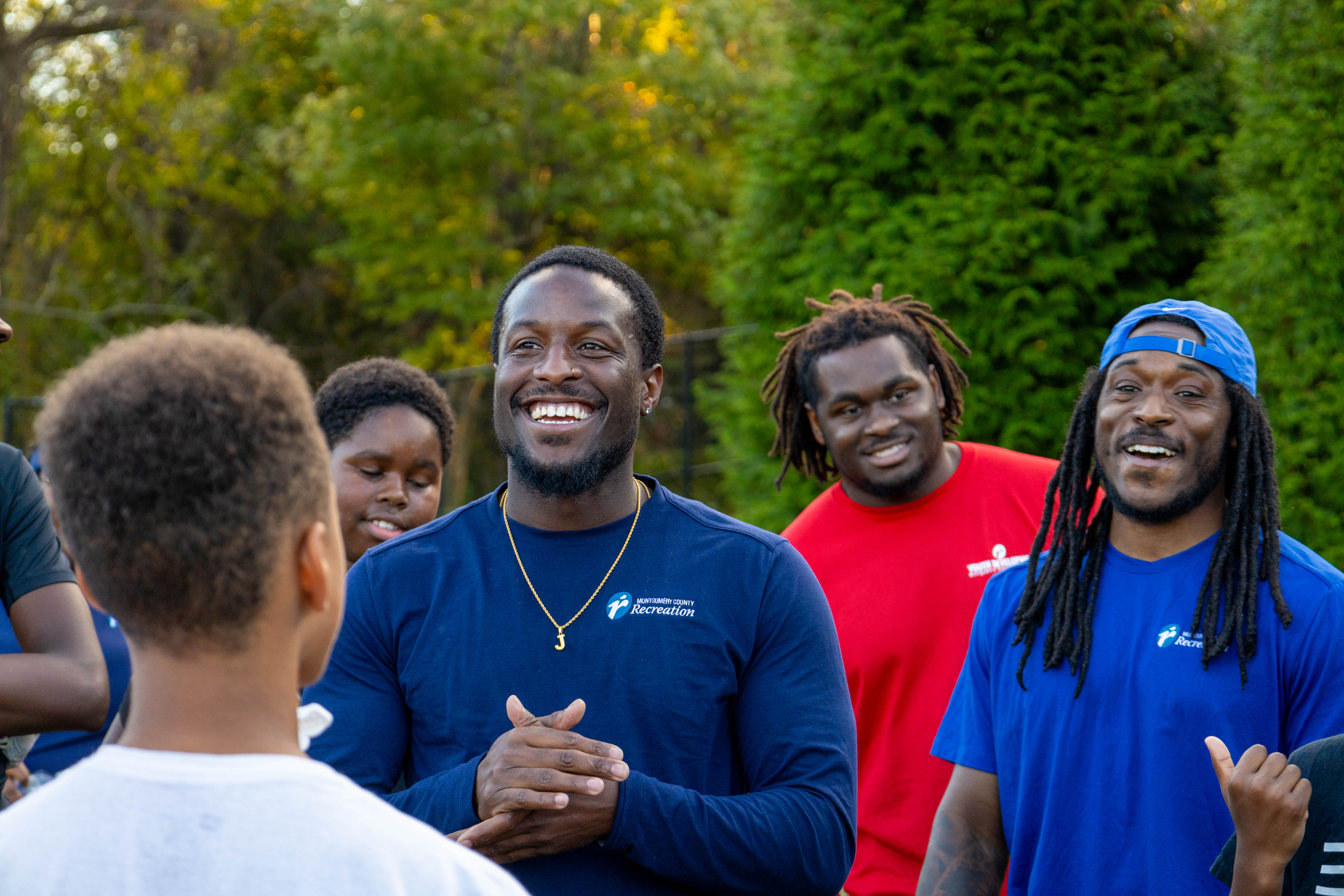 Image 5 of 9 in gallery section. Image title is Youth Development, Under the Lights.